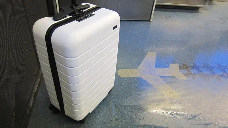 A lost luggage of Away brand waiting for its owner to bring it back