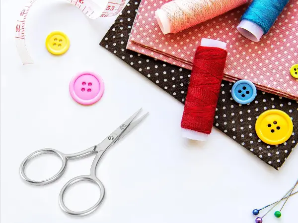 embriodery scissors on plane in carry on or checked luggage